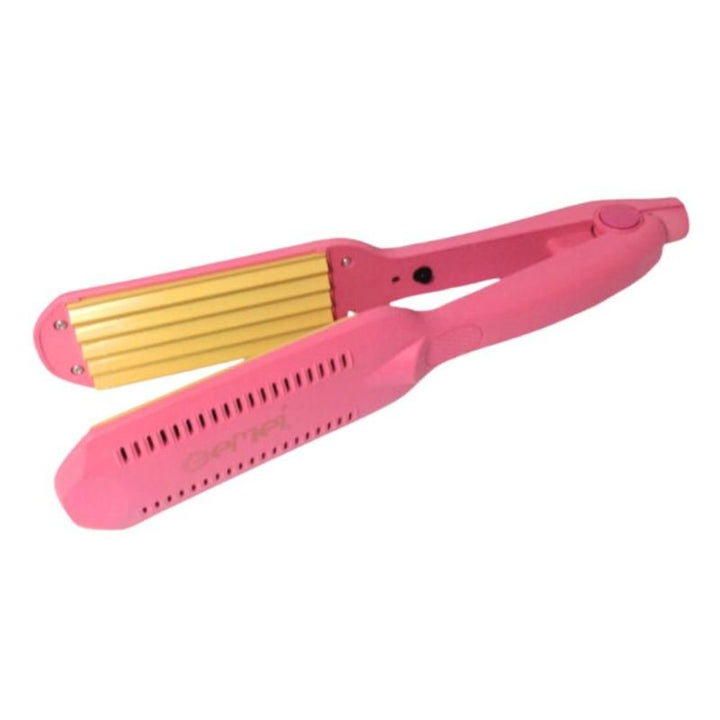 The Gemei PRO Crepe Iron / Ceramic Crimp GM-1959 by Gemei, in pink with gold ridged plates and a keratin tourmaline coating, is shown open and ready for zigzag curls.